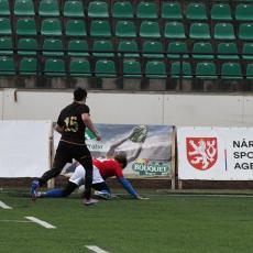 Přistání před poutačem Národní sportovní agentury